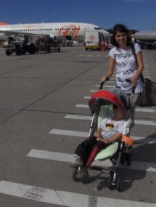 Carrinho de bebê no avião 